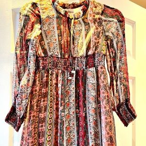 Buy this lovely dress in size 16 for any occasion.